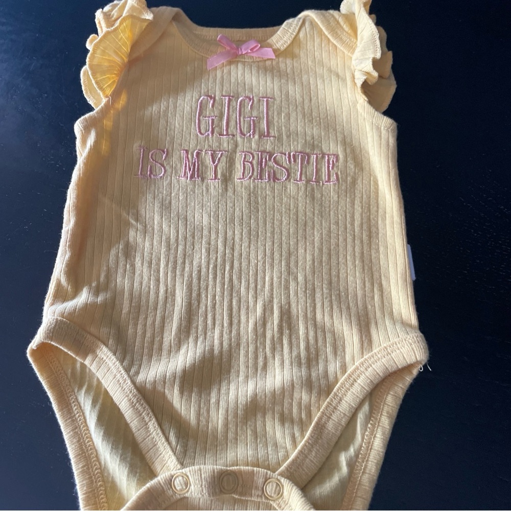 Tahari Yellow and Pink Bodysuit with Ruffled Sleeves (“Gigi is my bestie”)